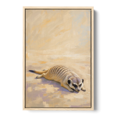 Meerkat Pup Stretched Out in the Warm Sand - Oak Framed Canvas Wall Art - Front
